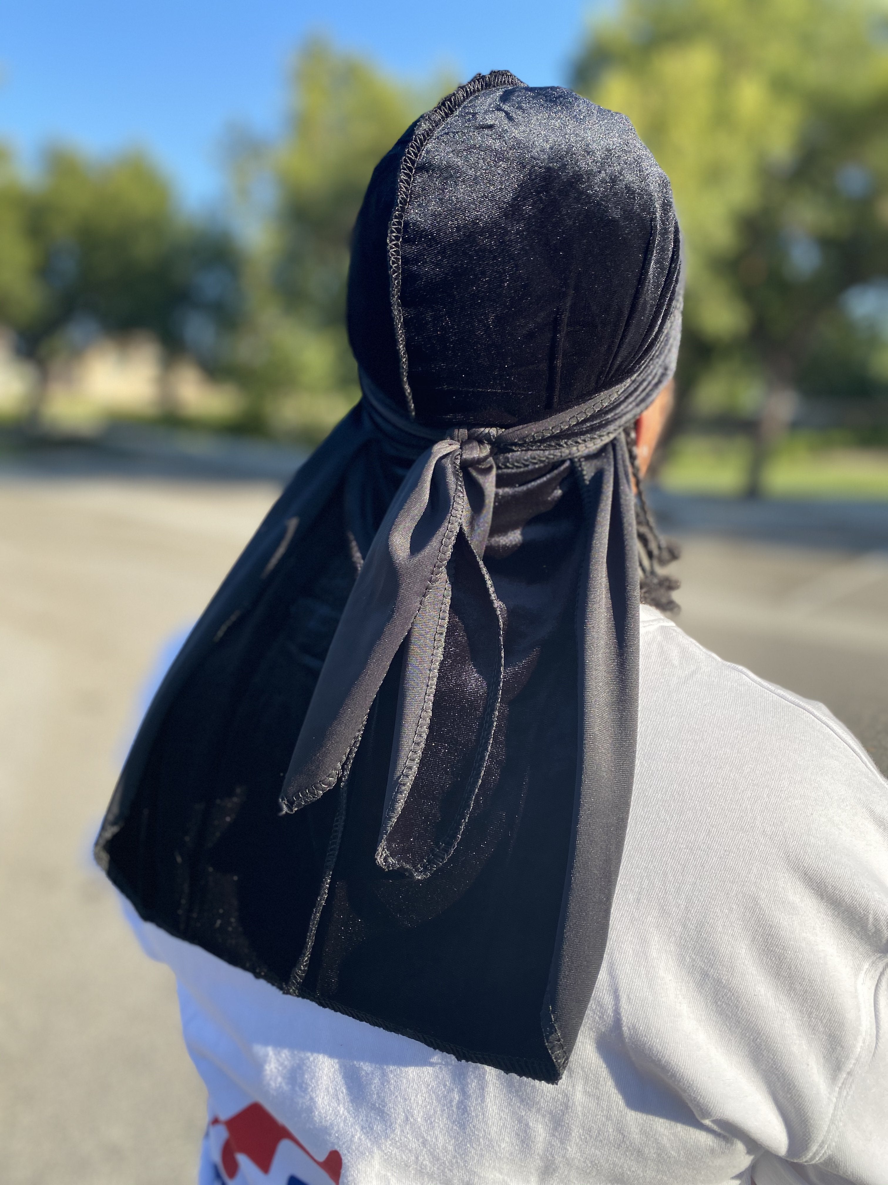 Black Premium Velvet Durag with extra-long tail for 360 waves, featuring reinforced stitching and velvet material